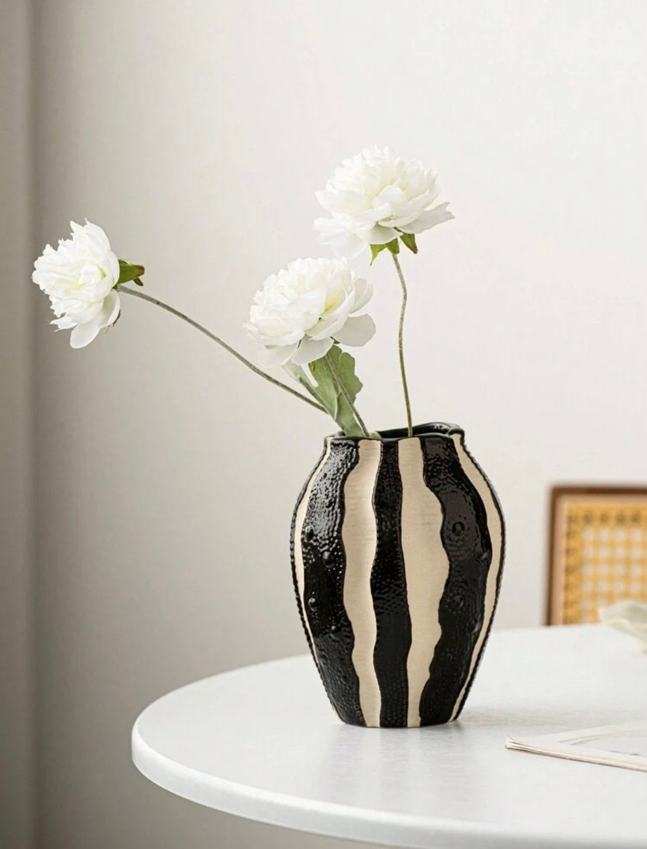 Ceramic vase with vertical stripes